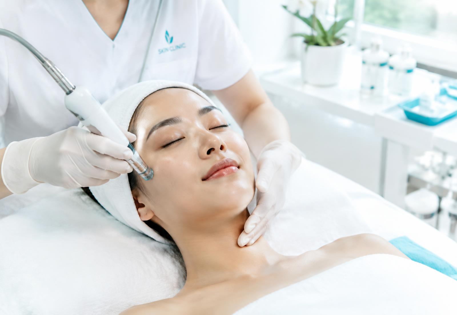 Woman receiving a professional facial treatment